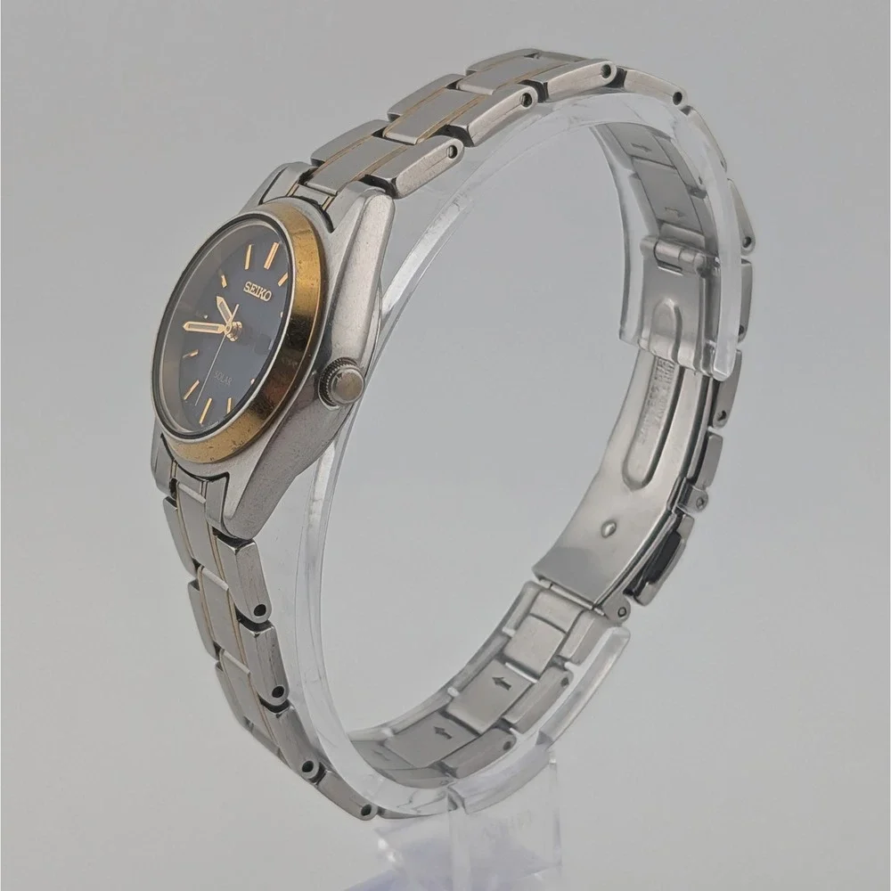 Seiko Solar V138-0AA0 Blue Sunburst Day/Date Two Tone Women's 25mm Watch